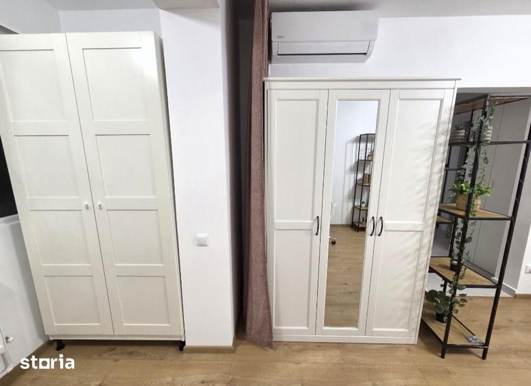 Garsonieră decomandată în Titan