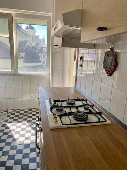 Apartament cu 4 camere semidecomandat, mobilat în Universitate