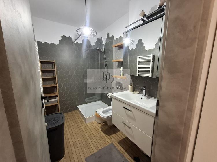 Apartament cu 2 camere semidecomandat, mobilat în Borhanci