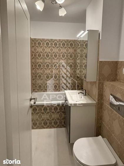 Apartament cu 3 camere, mobilat în Central