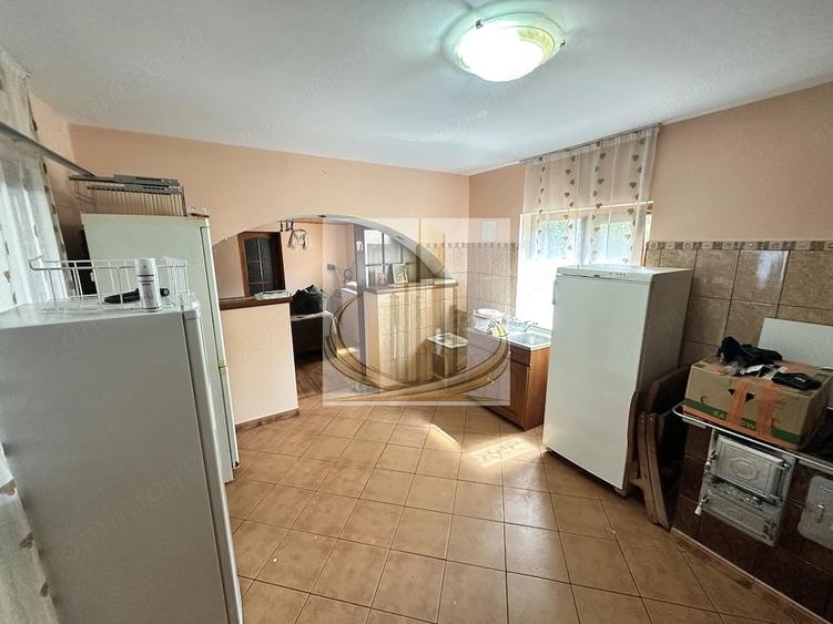 Casă cu 4 camere cu Teren 1000 Mp în Dofteana