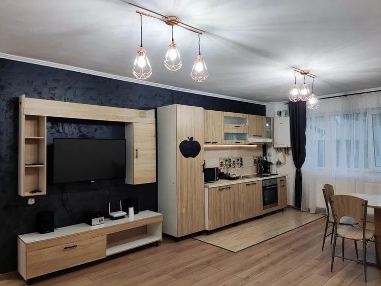 Apartament cu 3 camere semidecomandat, mobilat în Florești — fotografia 2