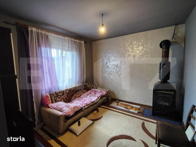 Casă cu 4 camere în Comșești