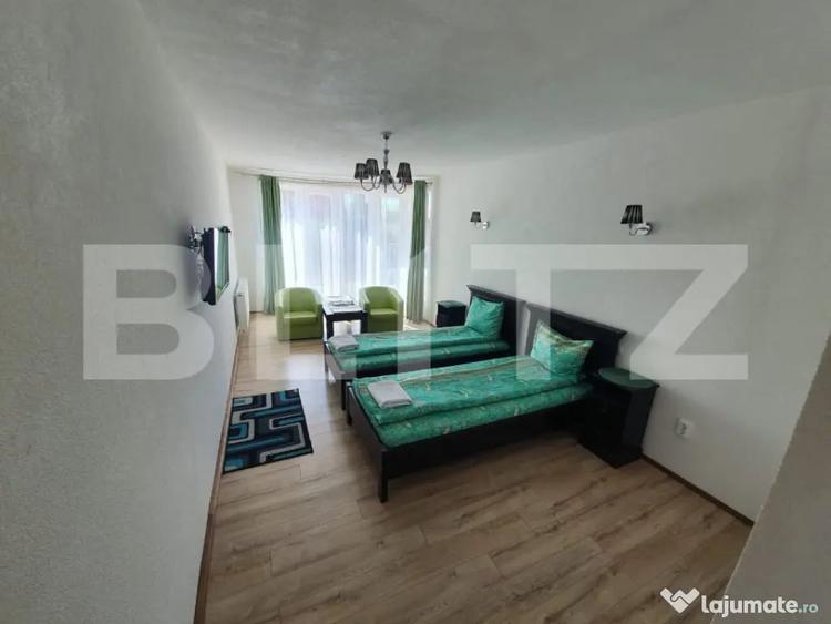 Casă cu 10 camere cu Teren 1100 Mp în Corunca