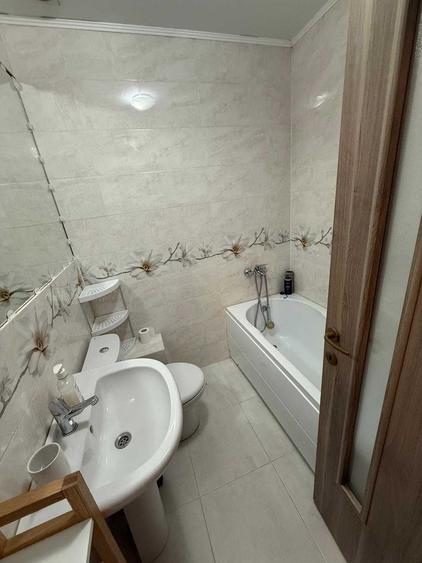 Apartament cu 3 camere semidecomandat în Nicolina