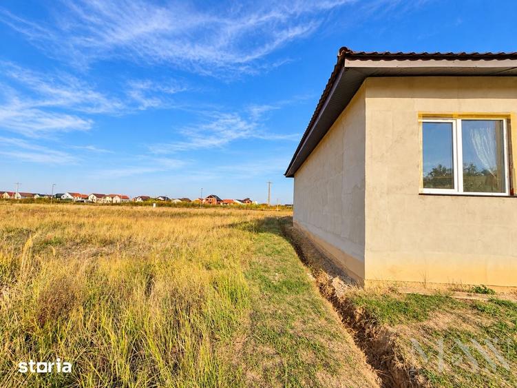 Casă cu 4 camere cu Teren 553 Mp în Sânmartin