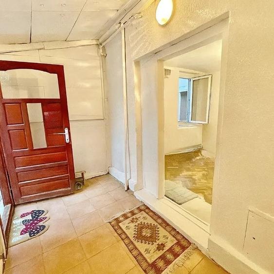 Casă cu 2 camere cu Teren 35 Mp în Romană
