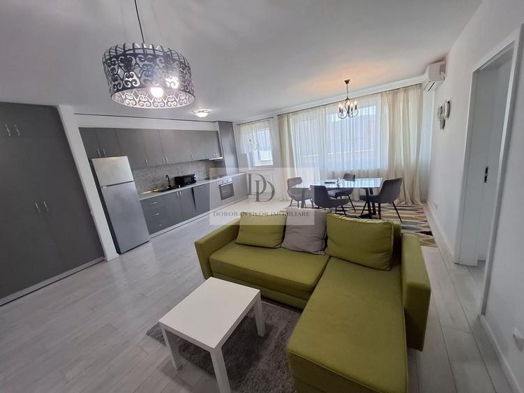 Apartament cu 2 camere semidecomandat, mobilat în Borhanci