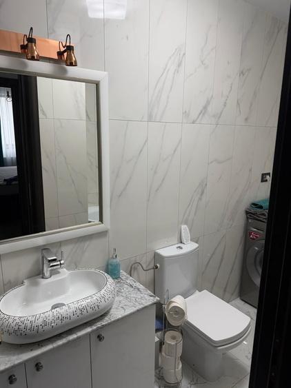 Apartament cu 4 camere decomandat în Titan