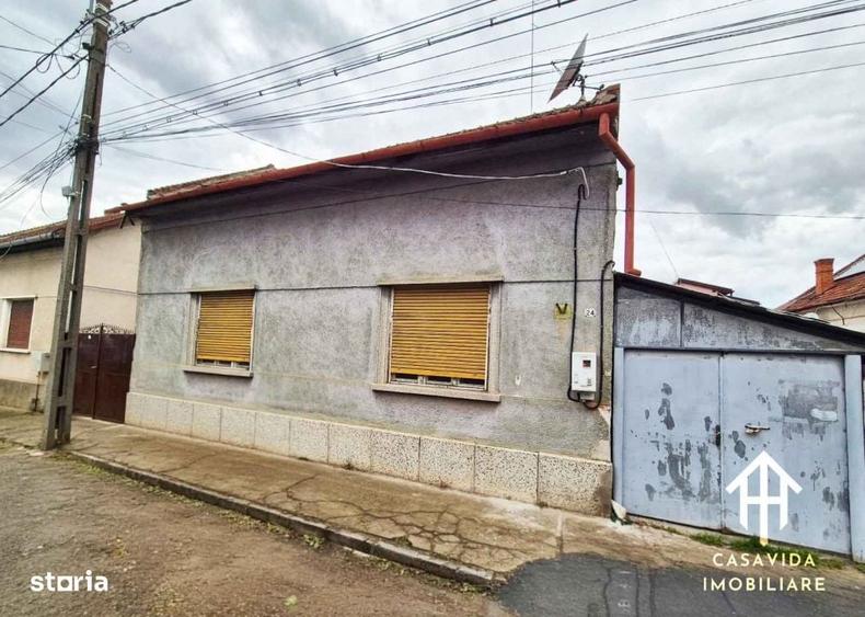 Casă cu 4 camere cu Teren 430 Mp în Central