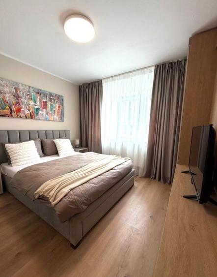 Apartament cu 2 camere semidecomandat, mobilat în City Park Mall