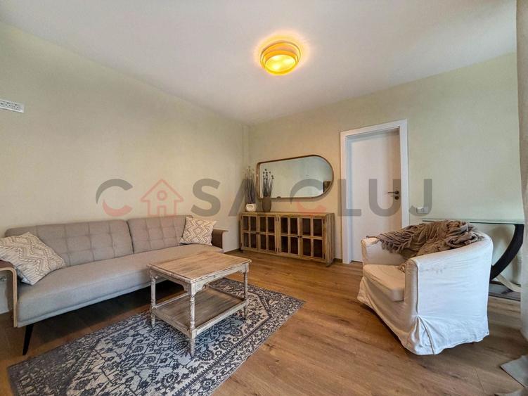 Apartament cu 3 camere semidecomandat, mobilat în Borhanci
