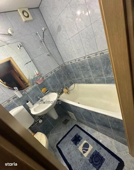 Apartament cu 4 camere decomandat în Titan