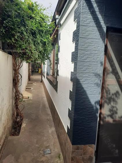 Casă cu 5 camere cu Teren 263 Mp în Radu Negru