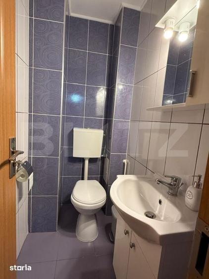 Apartament de vanzare 3 camere, 2 bai, decomandat, Tractorul, 2 locuri - 2