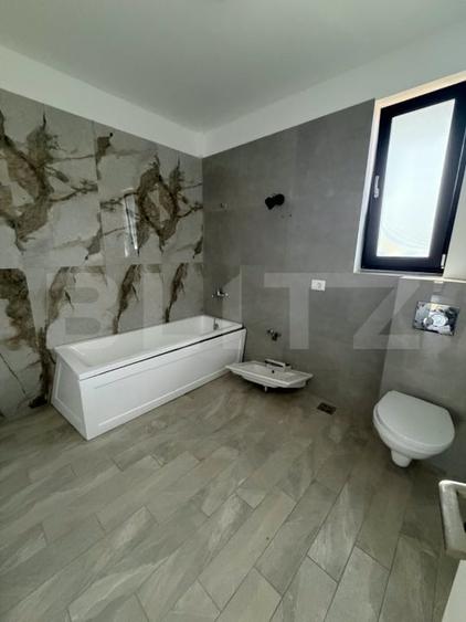 Casă individuală cu 4 camere cu Teren 425 Mp în Tomești