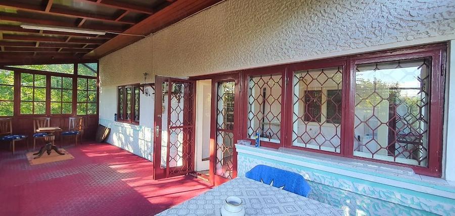 Casă cu Teren 1400 Mp în Central