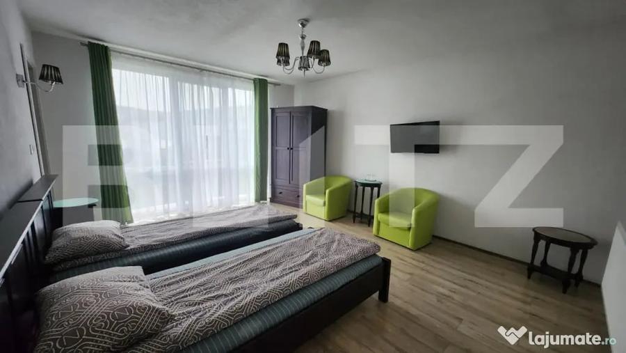 Casă cu 10 camere cu Teren 1100 Mp în Corunca
