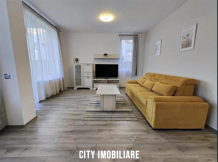 Apartament cu 2 camere semidecomandat, mobilat în Borhanci
