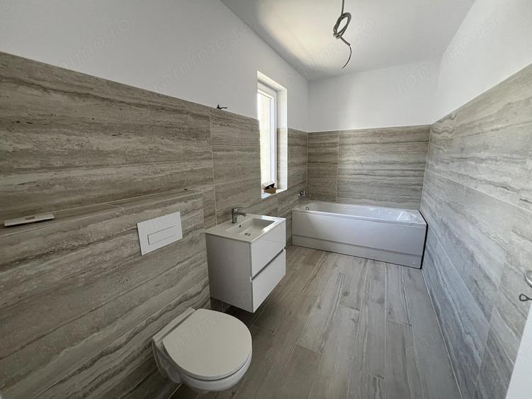 Casă cu 4 camere cu Teren 250 Mp în Chișoda