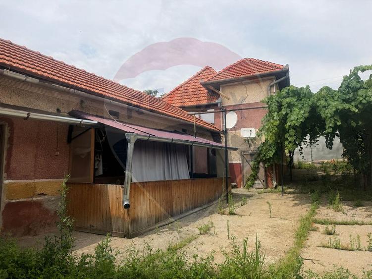 Casă individuală cu 4 camere cu Teren 1150 Mp în Romos