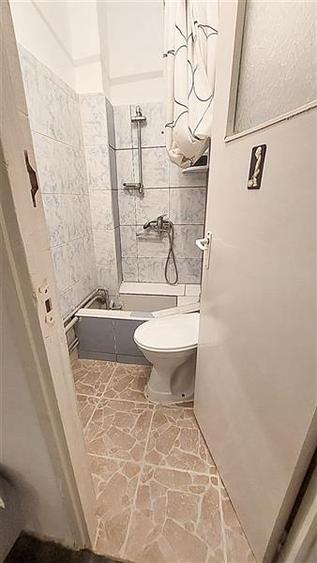 Apartament cu 4 camere semidecomandat în Centrul Civic