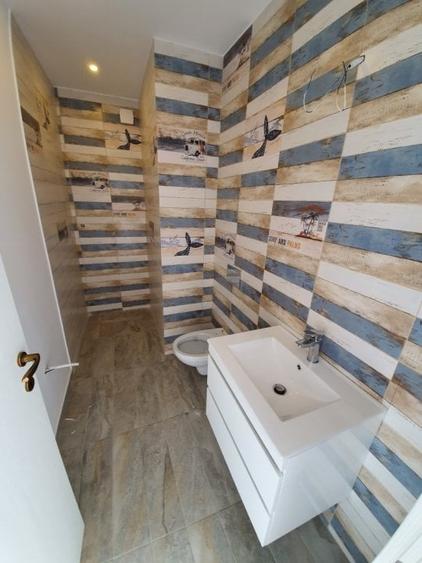 Casă cu 4 camere cu Teren 330 Mp în Tunari