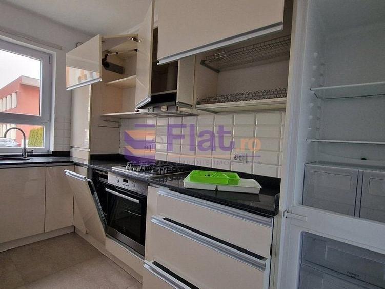 Apartament cu 3 camere decomandat în Tractorul
