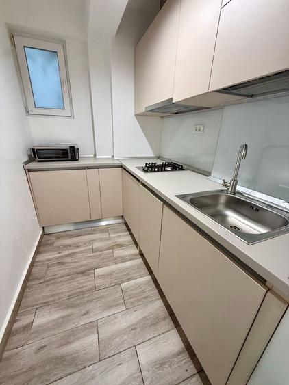 Apartament cu 2 camere semidecomandat, mobilat în P-ța Unirii