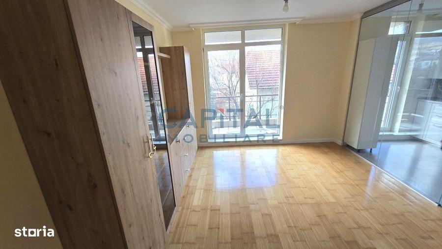 Apartament cu 2 camere semidecomandat, mobilat în Borhanci