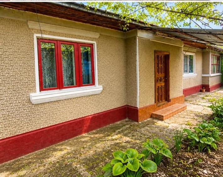 Casă cu 4 camere cu Teren 600 Mp în Central