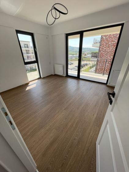 Apartament cu 3 camere decomandat în Bucium