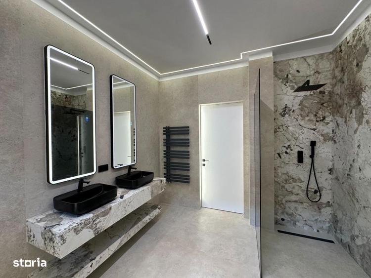 Casă cu 5 camere cu Teren 490 Mp în Tunari