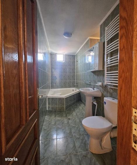 Casă cu 4 camere decomandat în Sânmartin