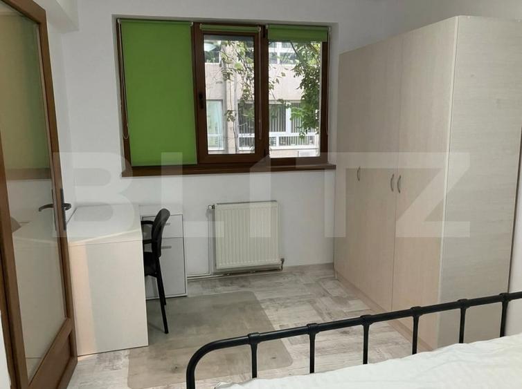 Apartament cu 2 camere semidecomandat, mobilat în Central