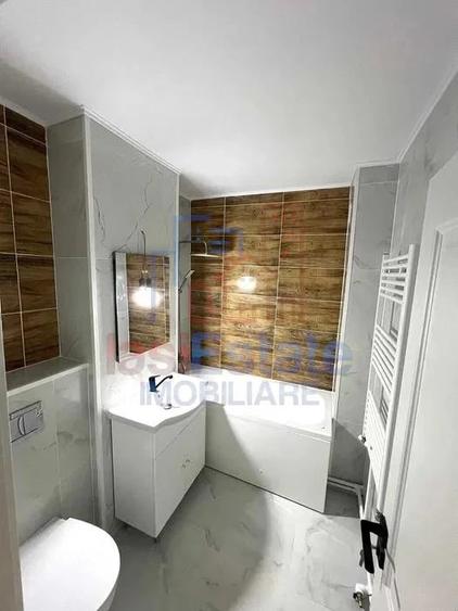 Apartament cu 4 camere decomandat în Filiași