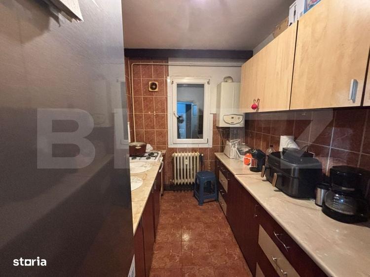 Apartament cu 3 camere nedecomandat în Podu Roș