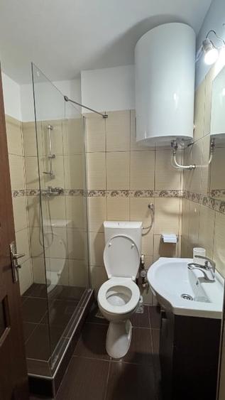 Apartament cu 2 camere semidecomandat, mobilat în Central