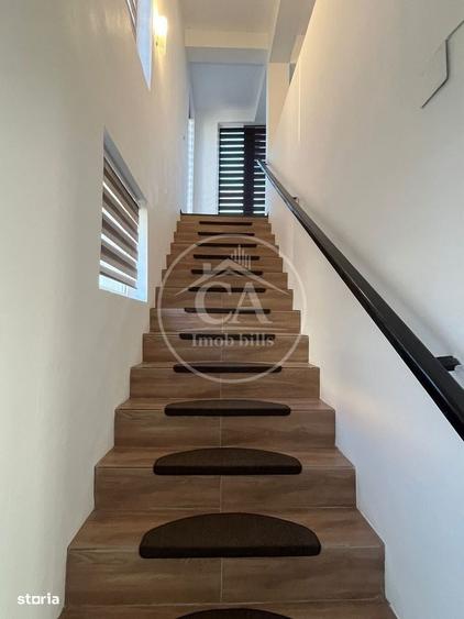 Apartament cu 4 camere decomandat în Rontău