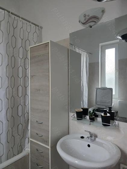 Apartament cu 2 camere semidecomandat, mobilat în Regie