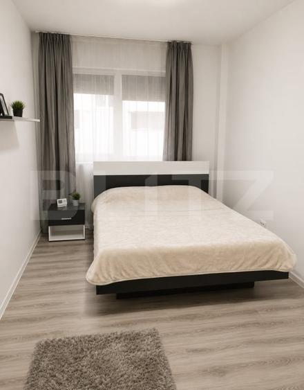 Apartament cu 2 camere semidecomandat, mobilat în Baciu