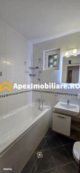Apartament cu 3 camere semidecomandat, mobilat în Titan
