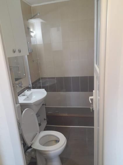 Apartament cu 2 camere semidecomandat în Podu Roș