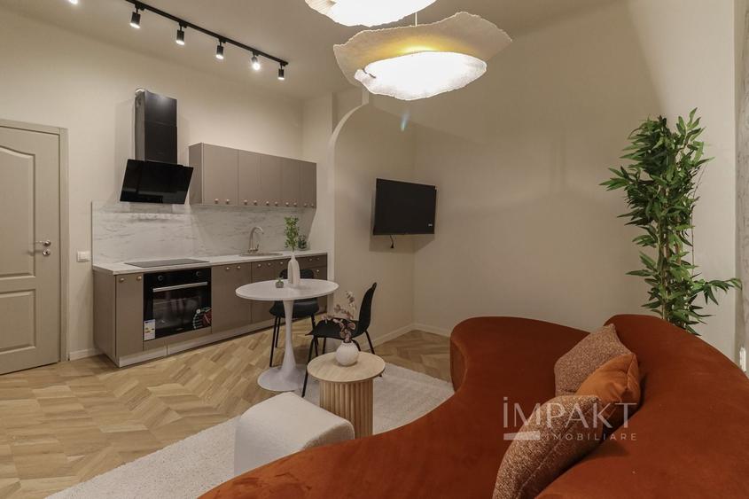 Apartament cu 2 camere semidecomandat, mobilat în Central
