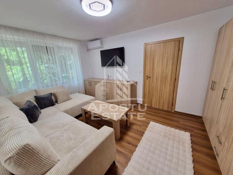 Apartament cu 2 camere semidecomandat, mobilat în Take Ionescu