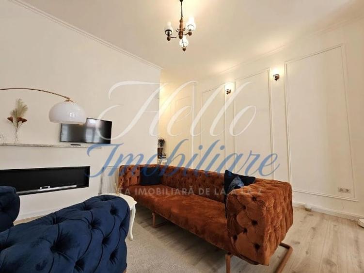 Apartament cu 3 camere semidecomandat, mobilat în Central