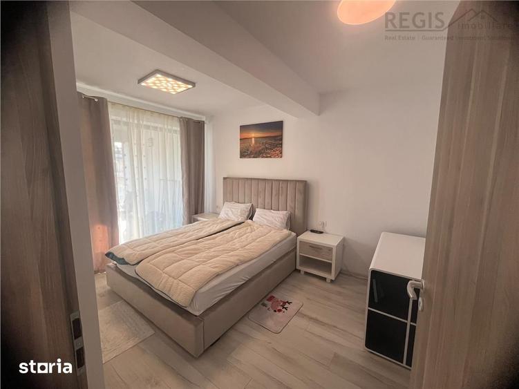 Apartament cu 2 camere semidecomandat, mobilat în Tractorul