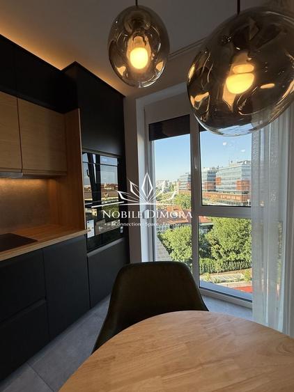 Apartament cu 2 camere semidecomandat, mobilat în Central