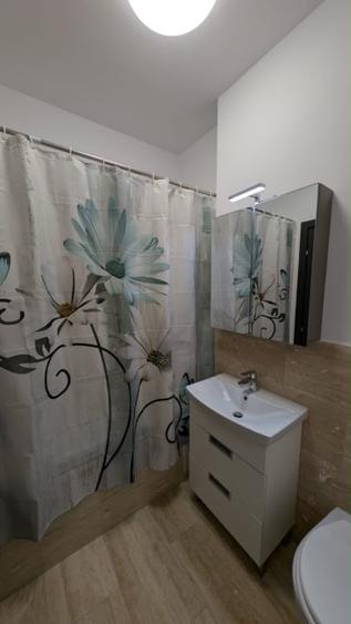 Apartament cu 2 camere semidecomandat, mobilat în Nicolina