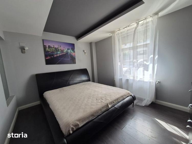 Apartament cu 2 camere semidecomandat, mobilat în Borhanci